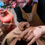 Doug Fitch and Hannah McAndrew making a jug for me